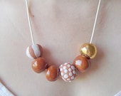 Sand Dollar: Ceramic Bead Necklace