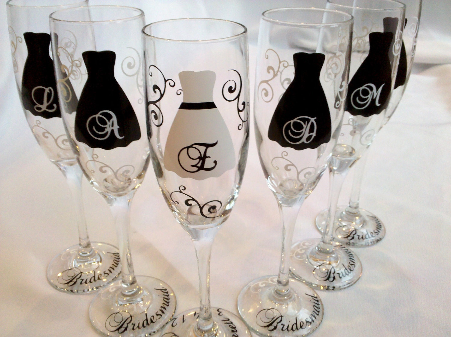 4 Bridesmaids champagne flutes, Personalized wedding glasses in black and white wedding colors, great gift idea