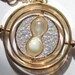 Harry Potter a Time Turner in Hand Necklace , Silver & Gold with Personalized Parchment Note (silver sparkly)