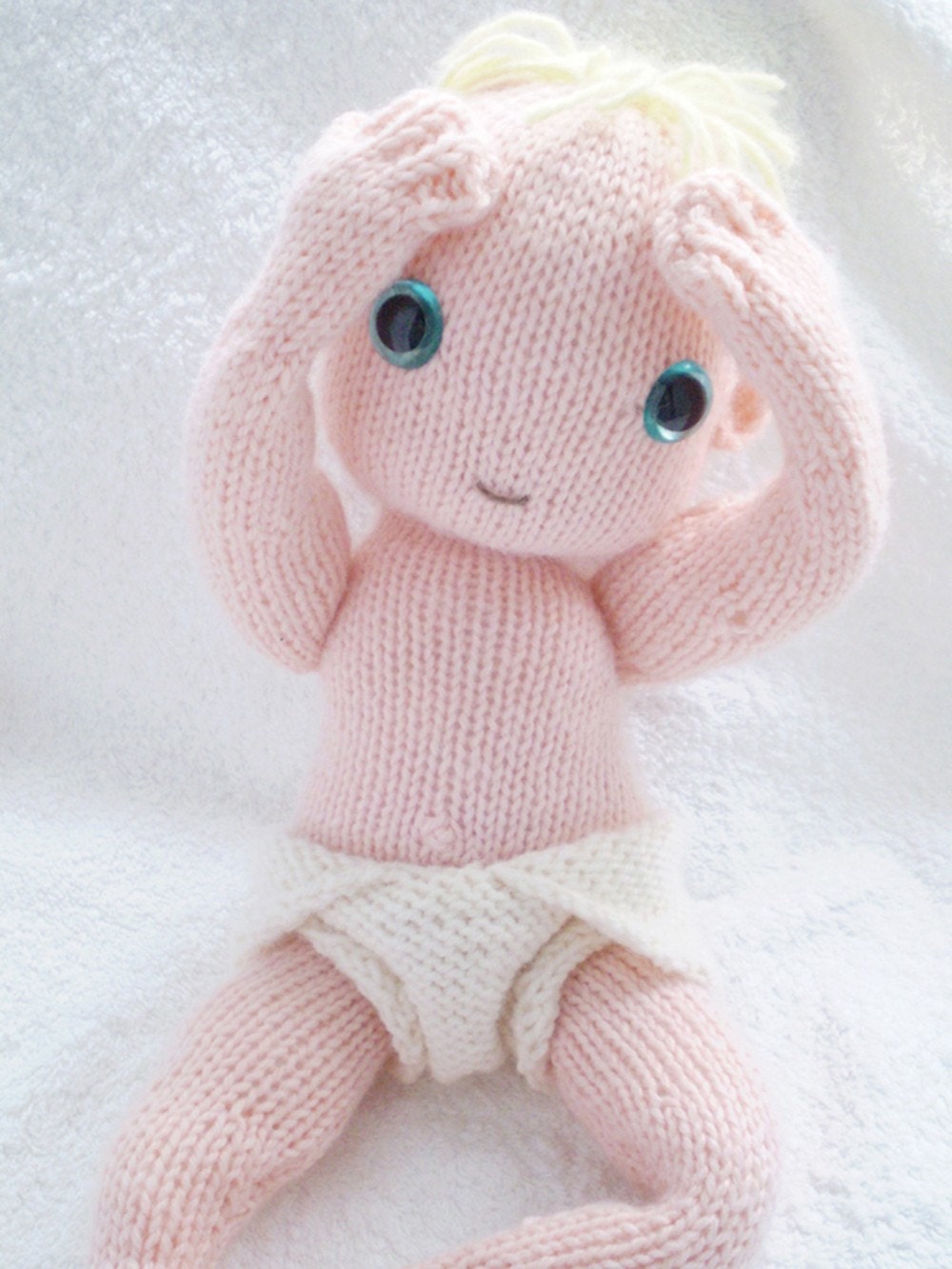 a pattern to knit this cute baby and nappy