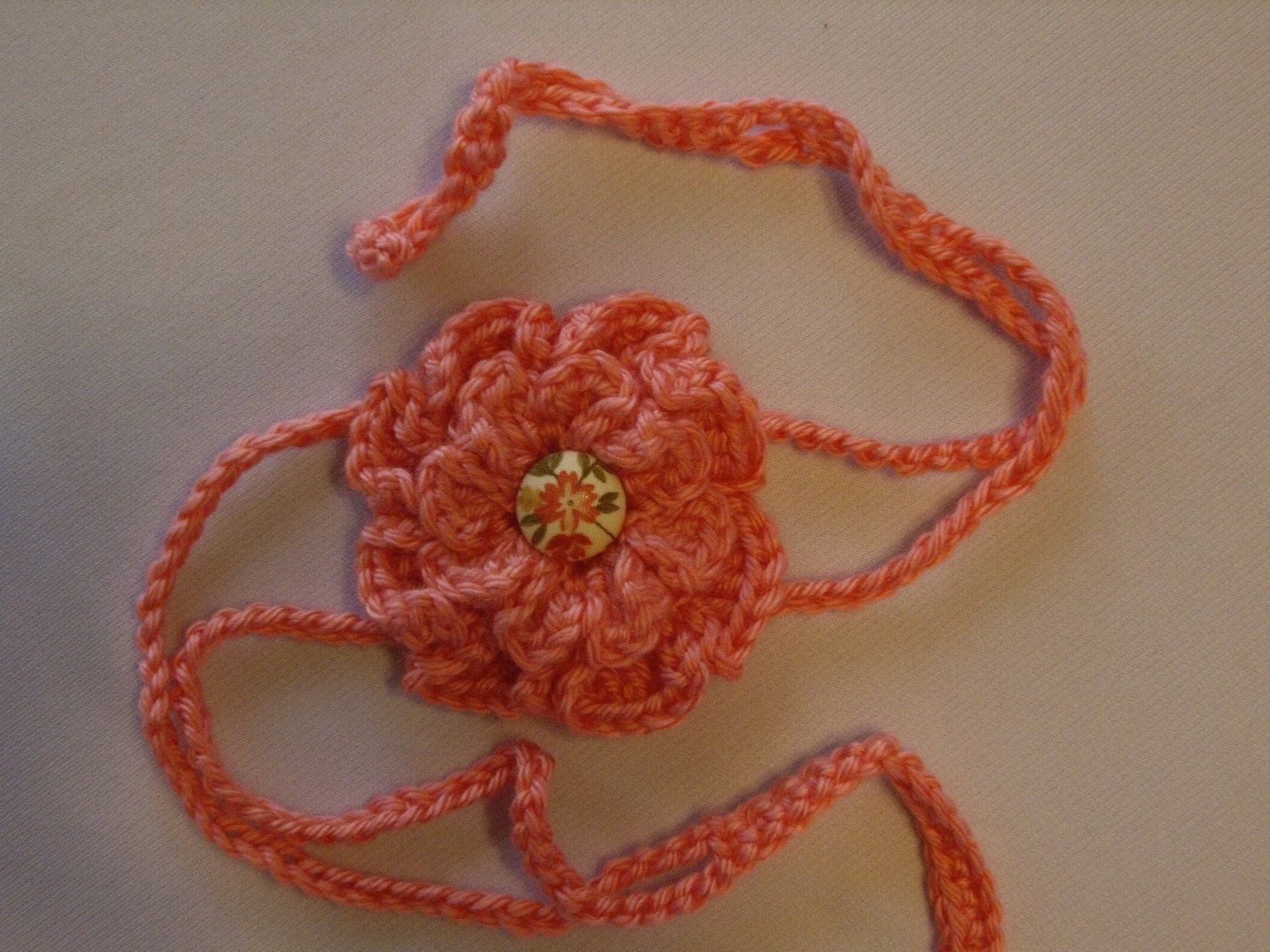 Peach crocheted 2 strand flower headband