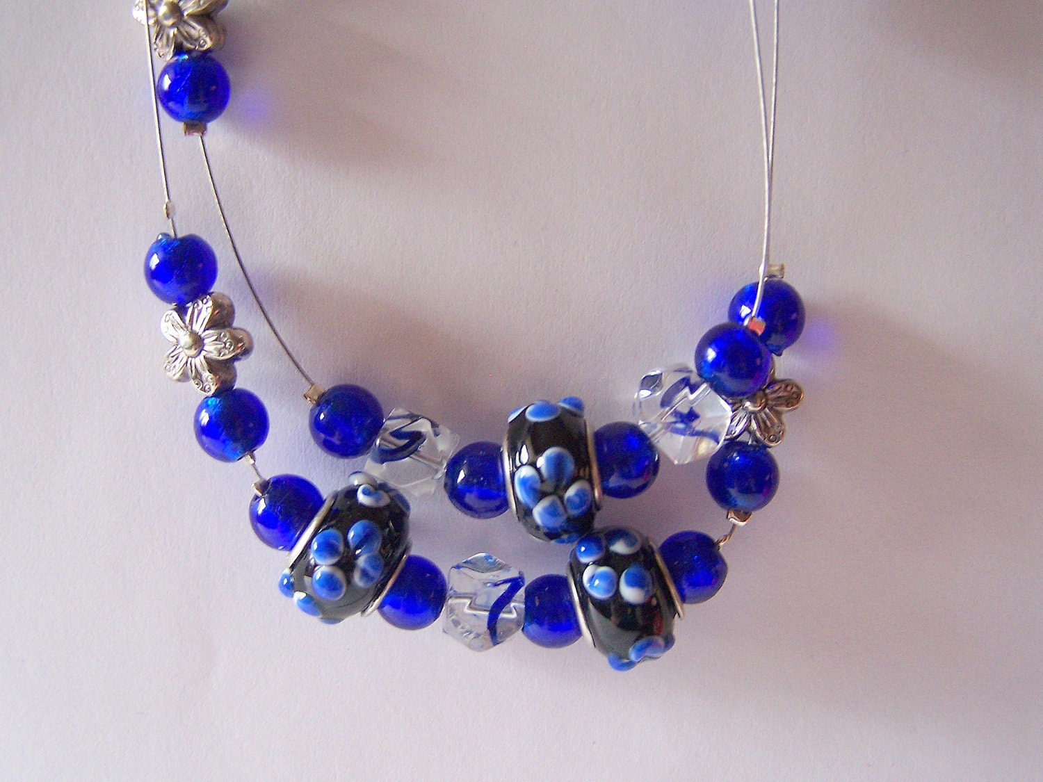 Cobalt Blue beaded necklace, handmade, two strand, glass bead, silver flower charm