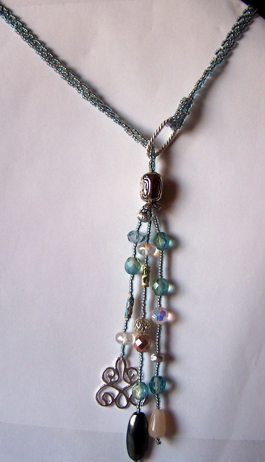 beadweaving necklace,blue, gold, lariat style necklace, blue, gold, silver celtic charm,versatile, fun