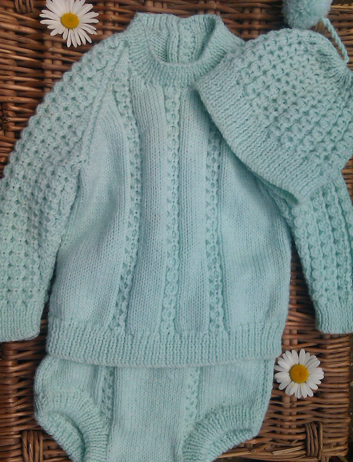 Little Boy's green outfit of sweater, pants and hat.