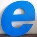 Reclaimed metal letter - e