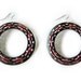 axle rose - pink geometric wheel earrings