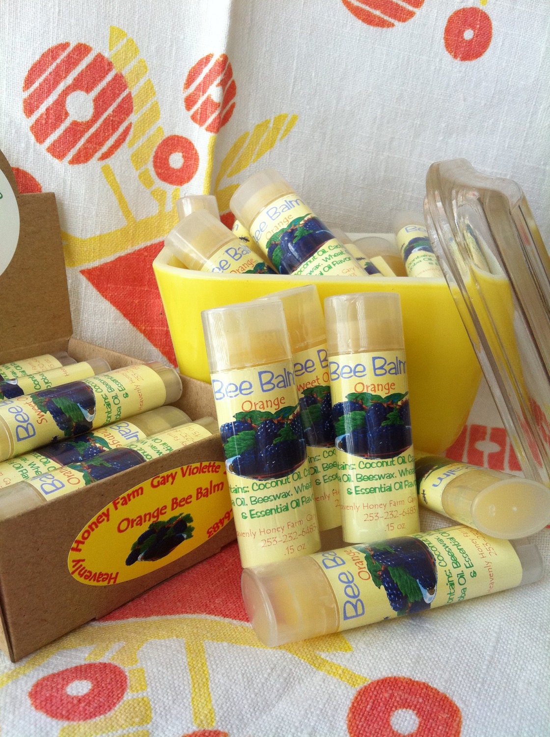 Bee Balm, Orange flavored lip balm in an oval tube