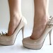 Asymmetrical Spiked Patent Leather Pumps - Nude
