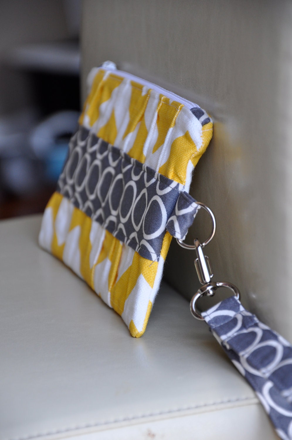 wristlet clutch with gathers and zipper, credit card pockets, removable strap