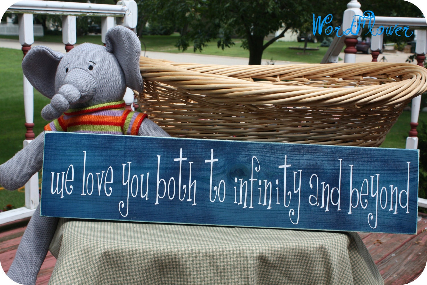 wooden sign with vinyl lettering - we love you both to infinity and beyond