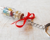 Lollipops in a jar keychain- Miniature bottles filled with colorful polymer clay lollipops with a red bow