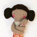Mother carrying baby with a foulard