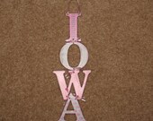 Pink IOWA Hawkeye sign
