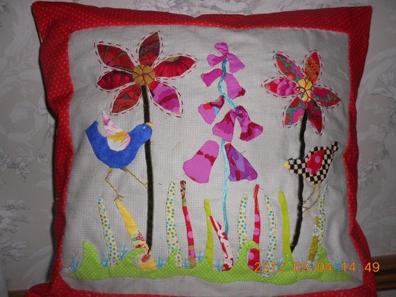 Hand appliqued folk art pillow very pretty. Birdies and flowers, gorgeous colors.15"x15"