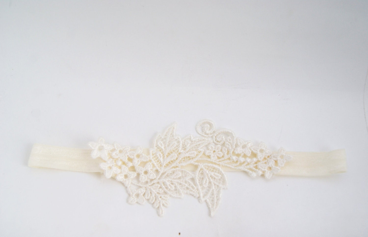 ivory garter with Venice applique