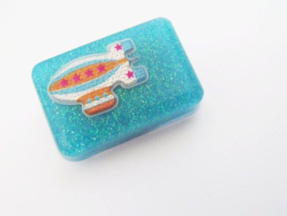 Space ship blue glitter badge pin