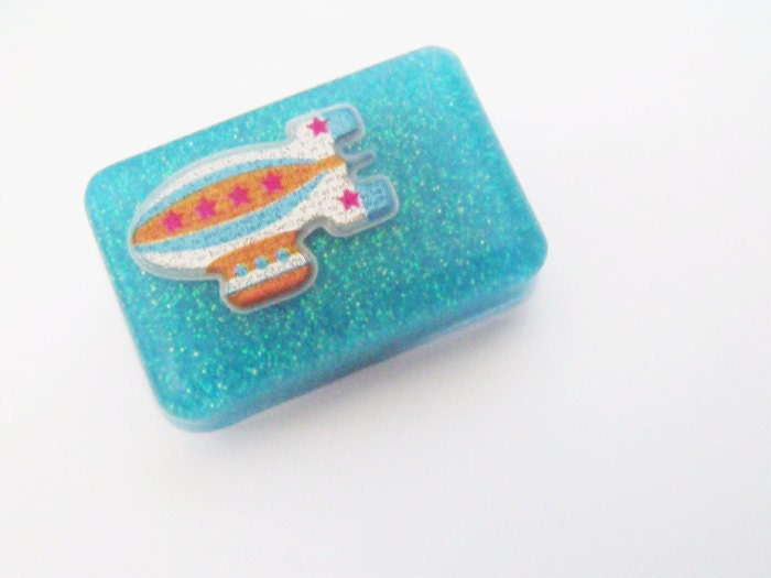 Space ship blue glitter badge pin