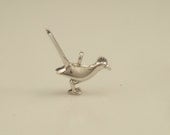 silver roadrunner pendant/ charm