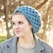 Blue crochet slouchy beanie in vegan acryclic w charity tree donation. Textured fall winter eco fashion men women.
