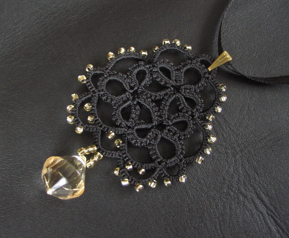 Black tatted lace pendant - lace motif with faceted teardrop - rosette with light gold colour beads - LandOfLaces