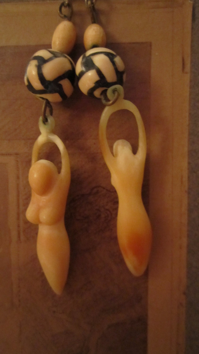 Goddesses hold the earth together Horn mother earth world knot earrings dangle handmade cream brown