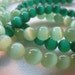 22 pcs of emerald green 22 pastel green Cat Eye Beads