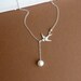Nature's Gift -- Sterling Silver Swallow and Cream Freshwater Pearl -- 925 Sterling Silver Necklace
