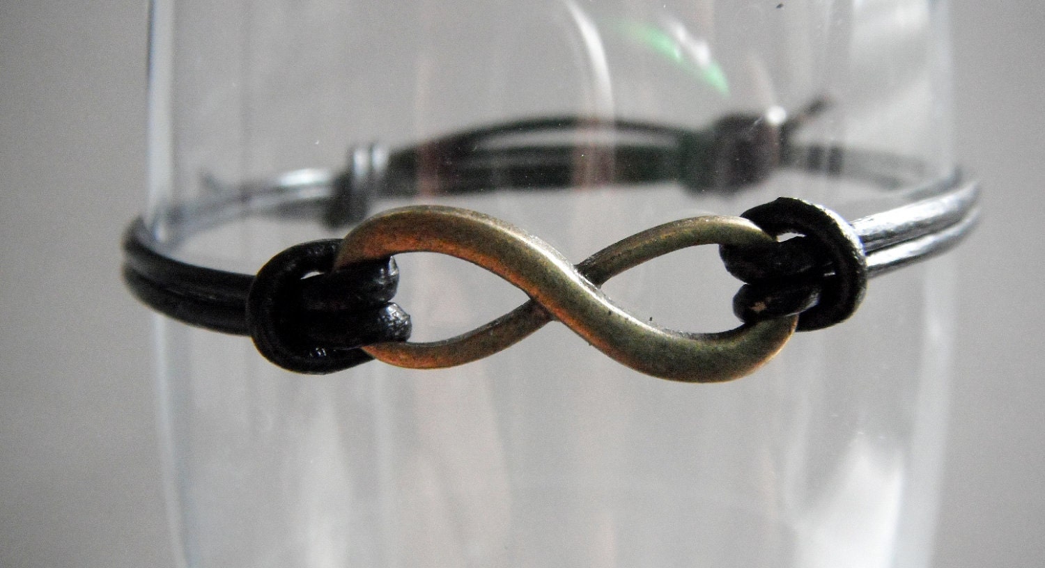 Antique Gold Infinity Bracelet with Black Leather Cord