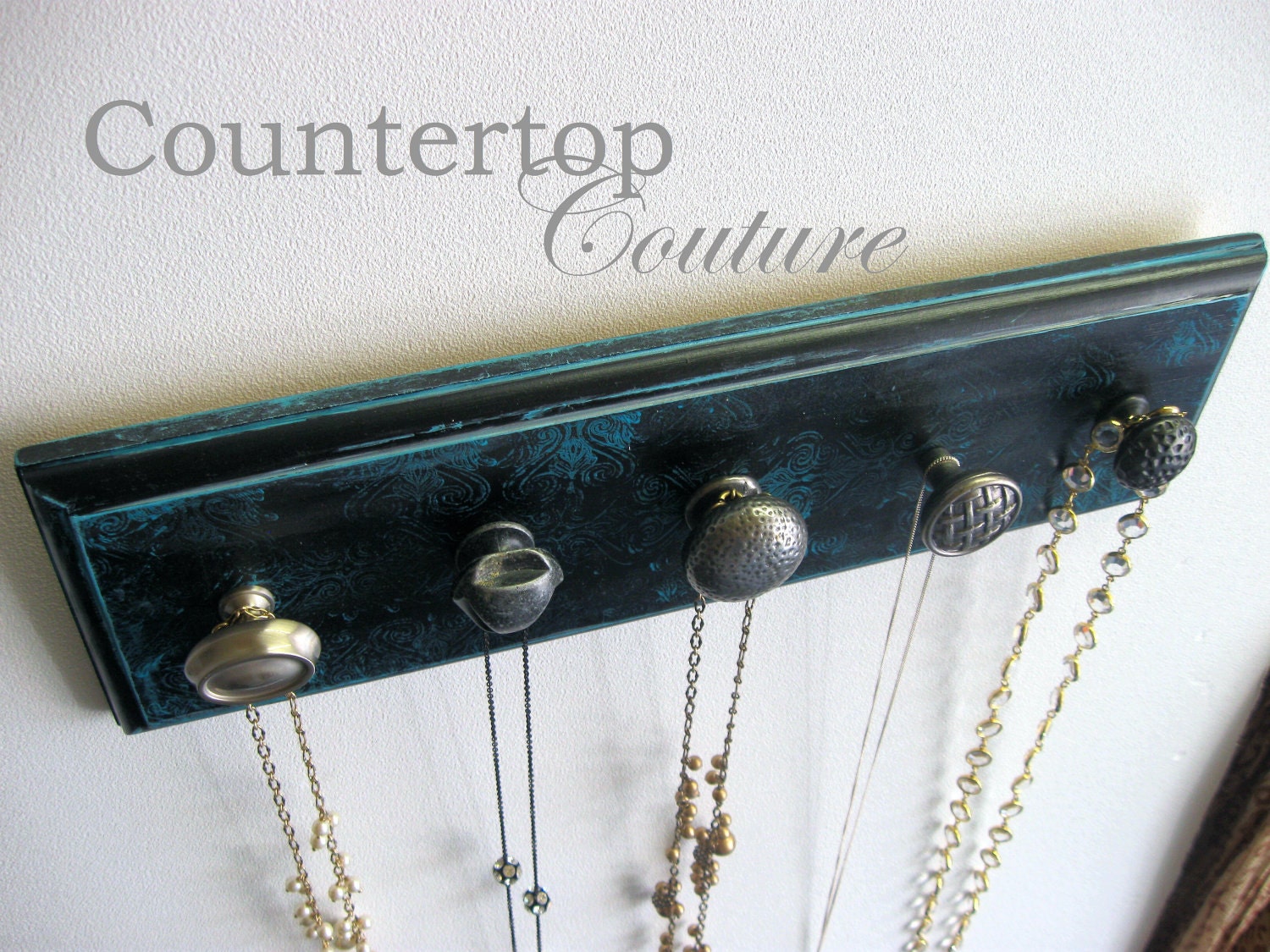 Jewelry Necklace Organizer Rack beautiful, quality knobs mounted on gorgeous black and blue hand-painted board