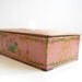 Dusky pink vintage tin box with art deco flowers, New York