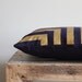 Doha in Metallic gold hand printed on navy blue organic hemp pillow cover 12x21