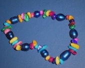 The Mardi Gras Bracelet/Genuine freshwater pearls in blue with mother of pearl chips in multi color