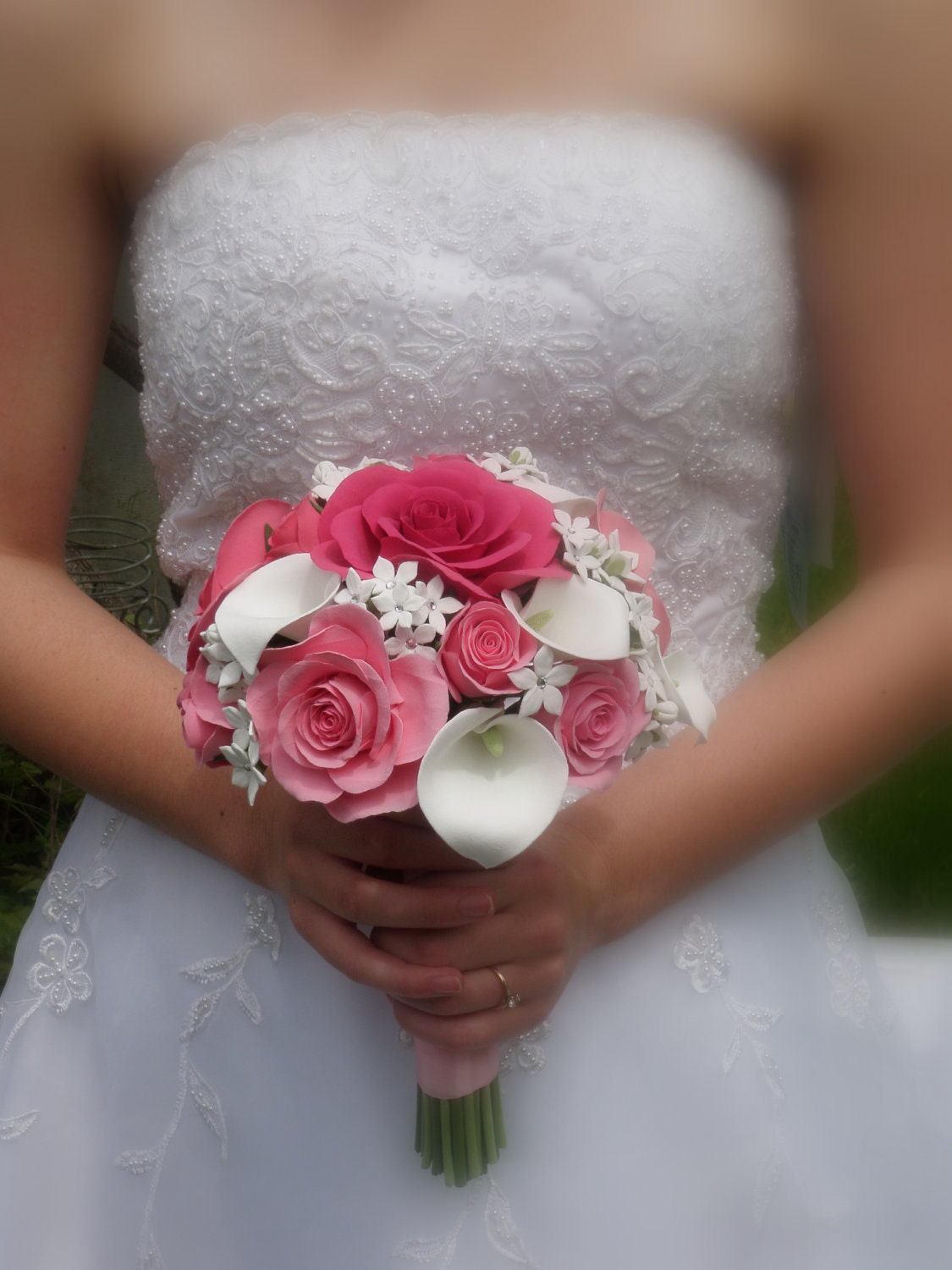 Absolutely elegant bouquet with pink roses, calla lillies and stephanotis flowers