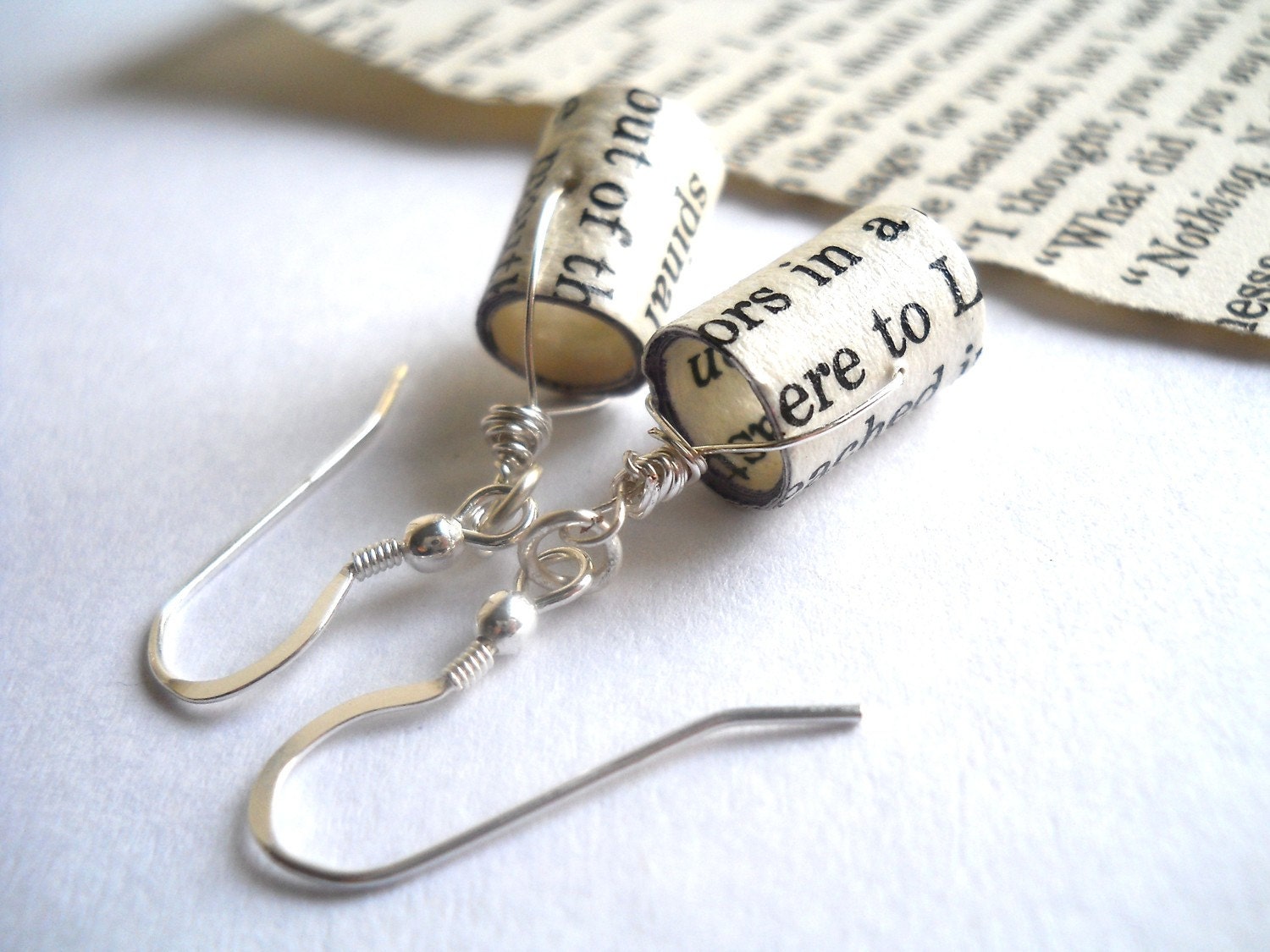 Bookworm earrings, made from old books