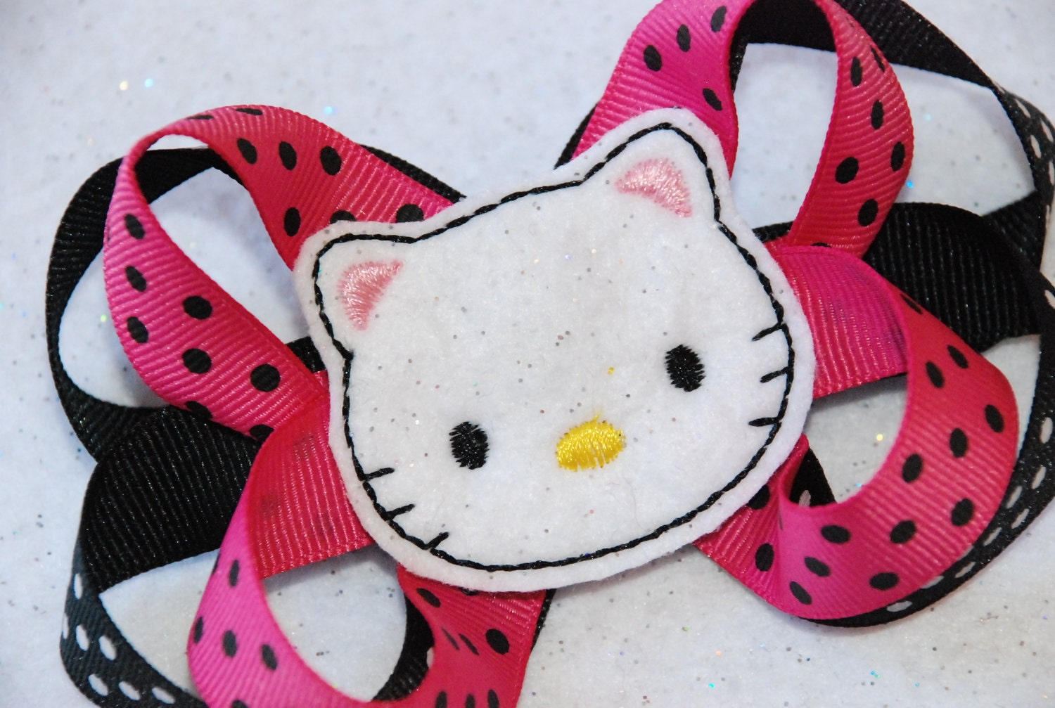 Hello Kitty inspired - Glittery Felt Machine Embroidered Kitty Face Centered on a Ribbon Hair Bow