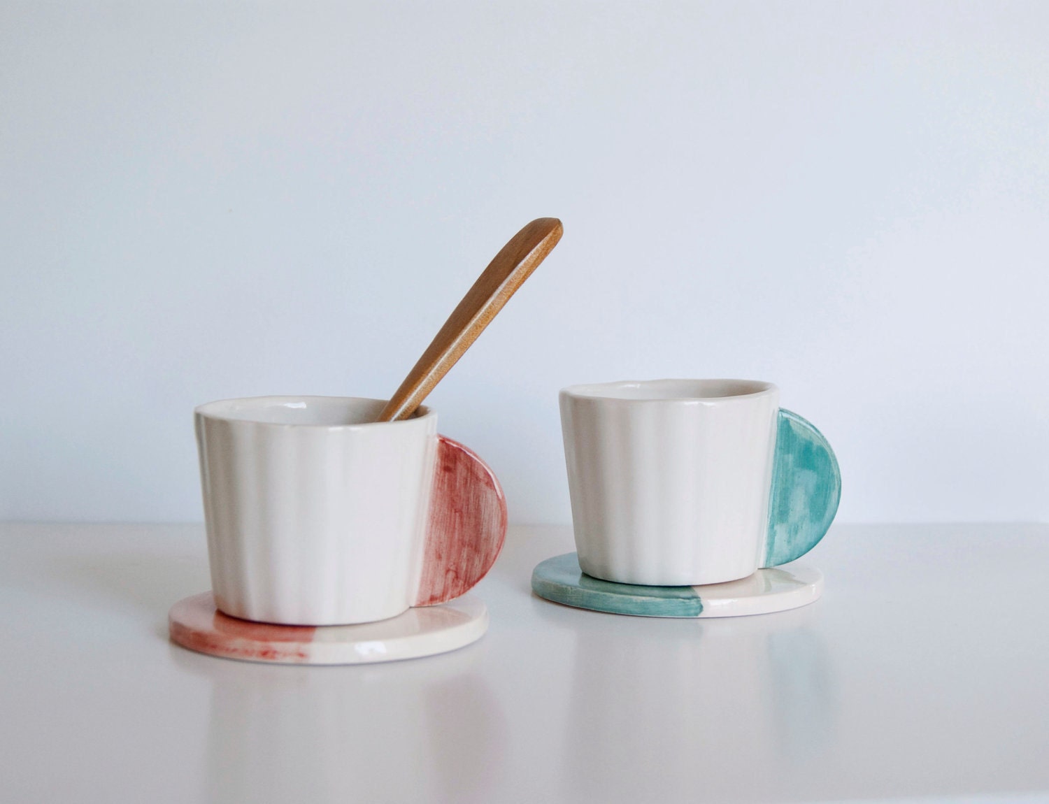Set of two ceramic coffee cups with dish