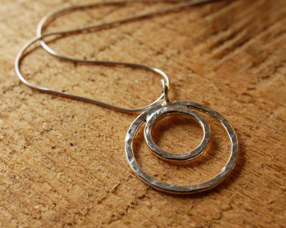 hammered small sterling silver circle inside a larger circle pendant necklace
