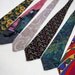 Six Vintage Ties ranging from sunflowers and German vodka to vibrant graphics and silk Gianni Versace
