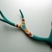 Green, Orange, Yellow and Blue Diamond Patterned Sika Antler