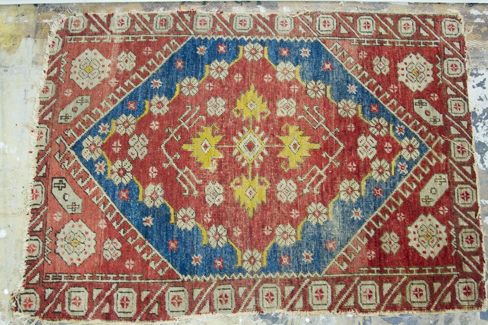 Playful Tattered Vintage Turkish Rug