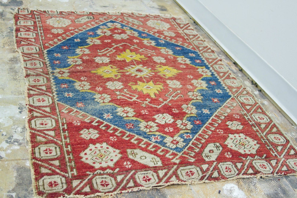 Playful Tattered Vintage Turkish Rug