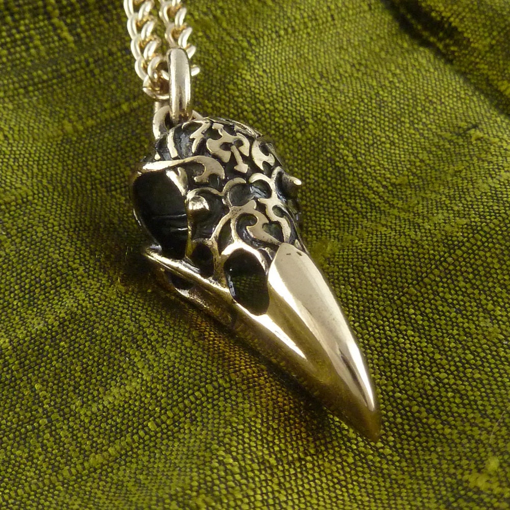 Raven Skull Necklace Bird Skull Pendant with Tribal Motif Bronze Bird Skull on 24" Gold Plated Chain