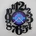 vinyl record clock (artist is Holiday for Strings)