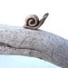 Snail figurine made by hand from pure bronze