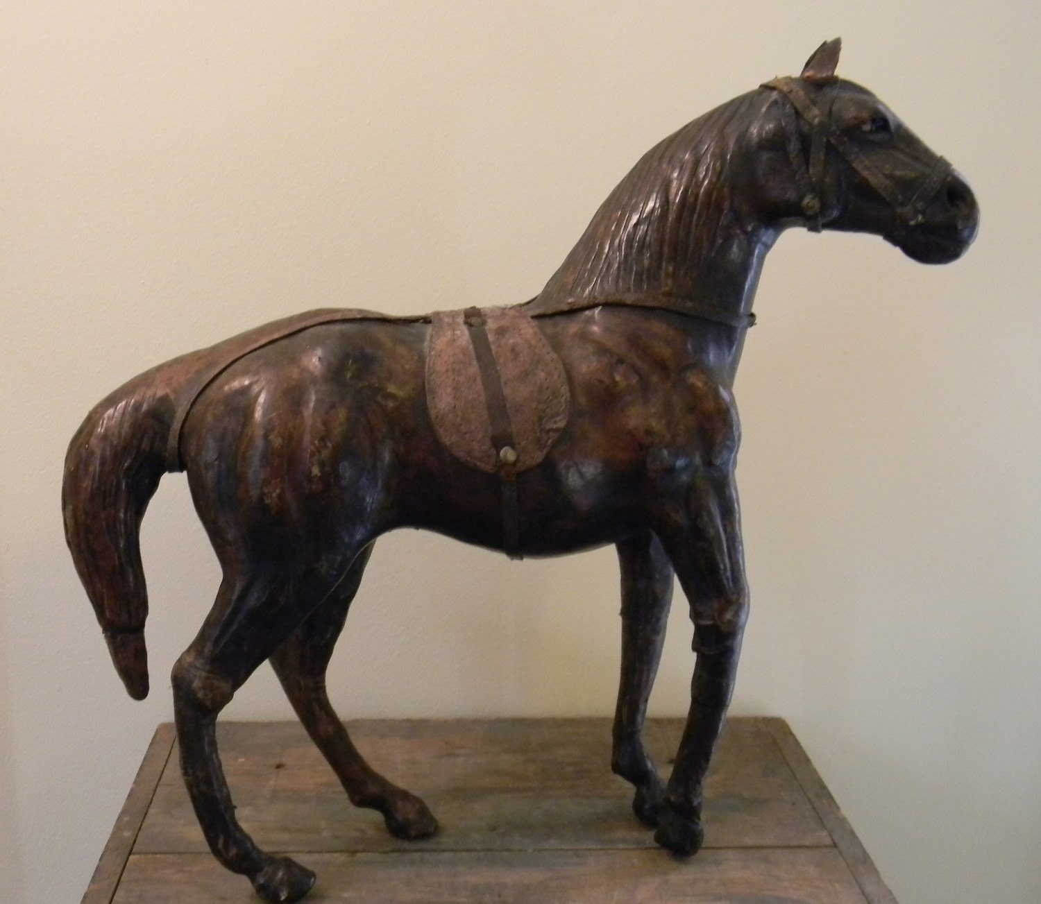 leather covered horse figurine