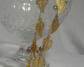 Golden filigree leaf earrings SALE