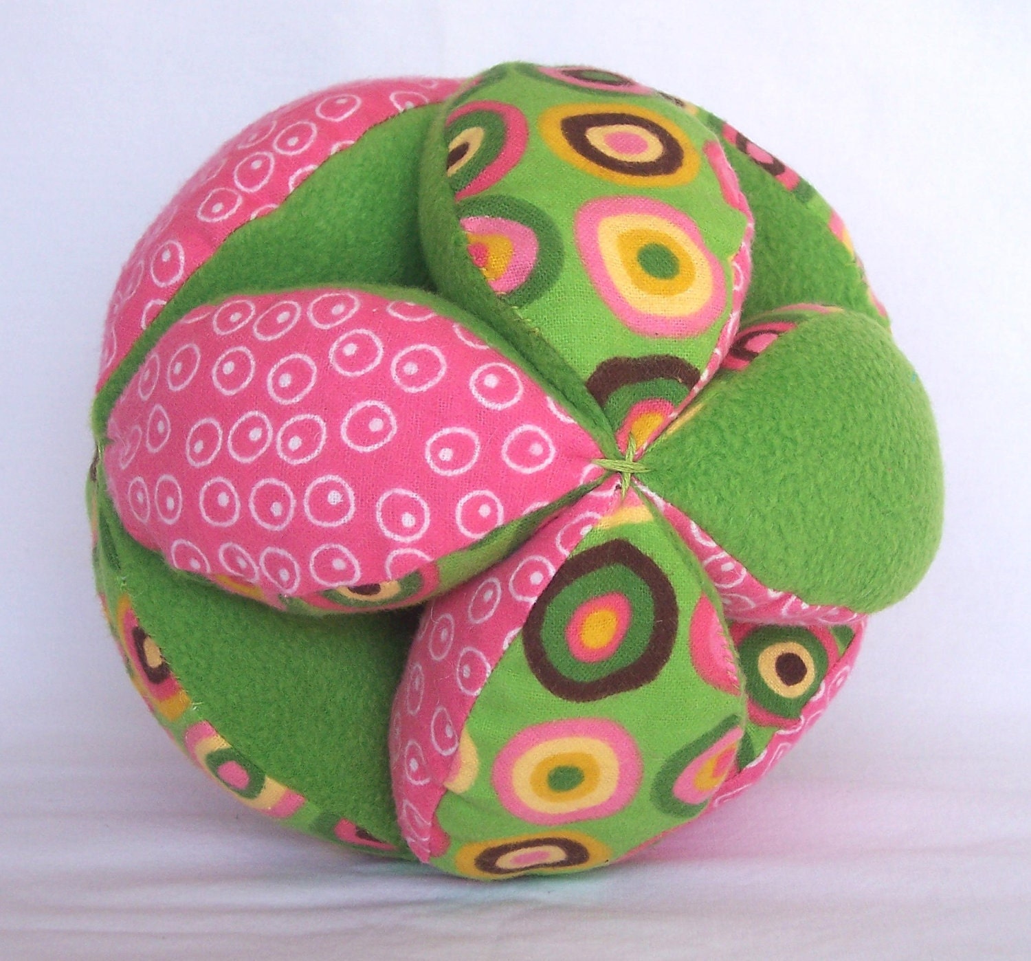 Green and Pink Circles Grab Ball