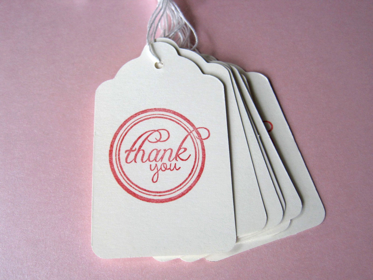 Set of 10 stamped tags with string -- "thank you"