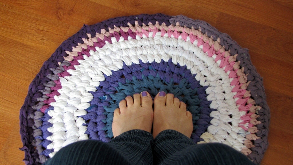 Upcycled T-Shirt Rug in shades of purple, blue and white, small, circular, washable, rustic.