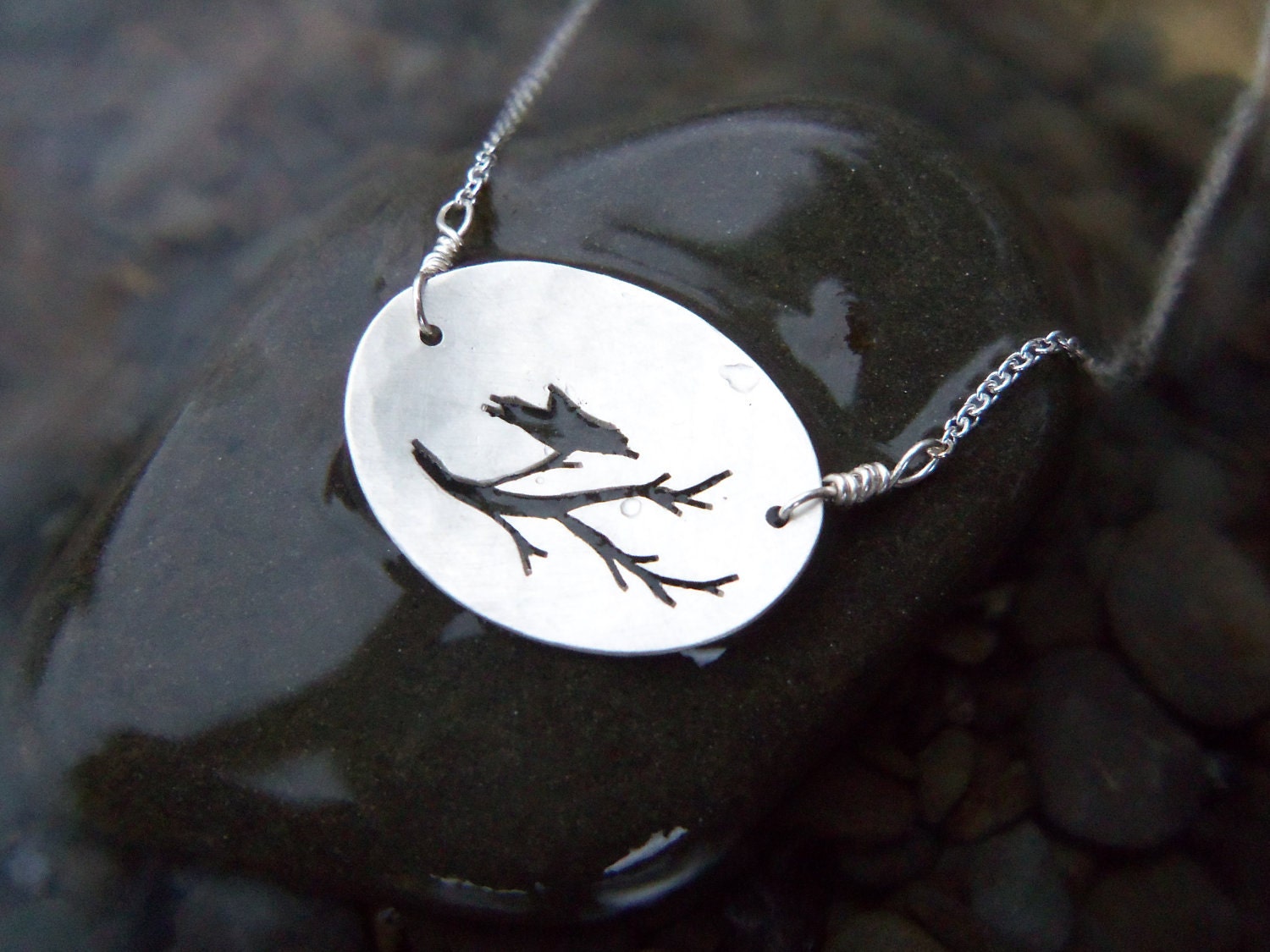 Sterling Silver Bird Necklace. Hand cut  Bird silhouette in Oval Pendant